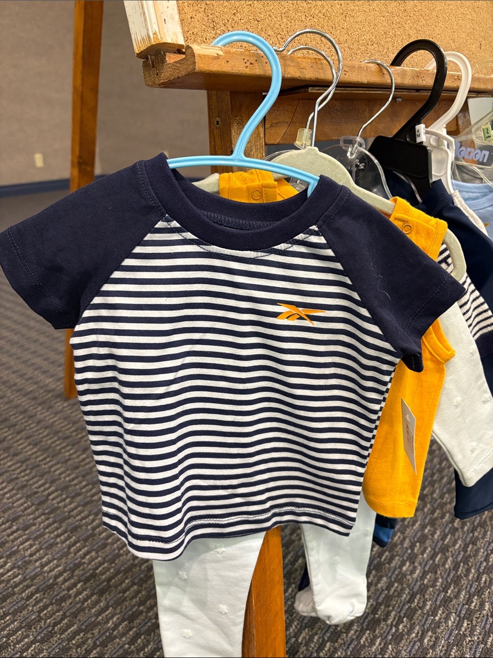 Reebok Navy & White Striped Tee with Orange Logo
